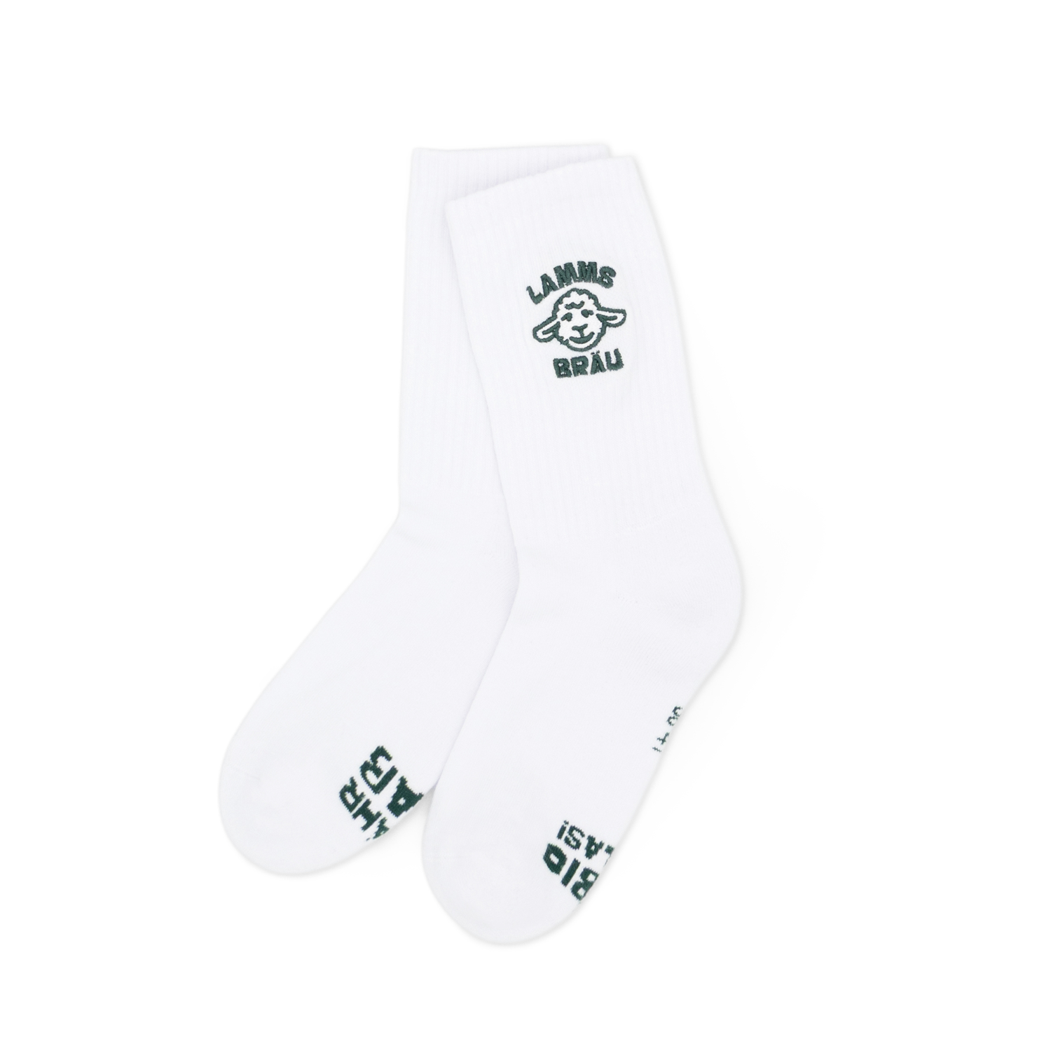Zwei weiße Socken mit dunkelgrünem Lamm-Kopf-Motiv und Schriftzug "LAMMS BRÄU" auf der Oberseite, präsentiert in aufrechter Position vor hellem Hintergrund.